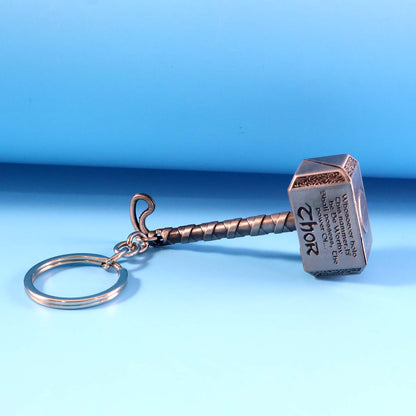 Metal hammer keychain with sturdy metal ring holding keys