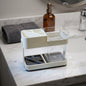 Multipurpose toothbrush holder set on bathroom countertop