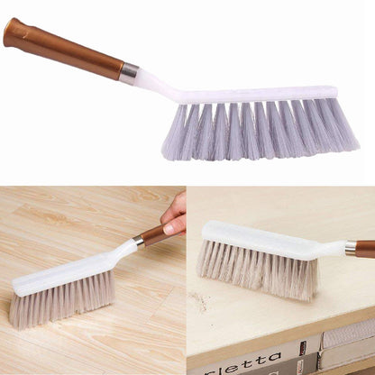 Sturdy household cleaning brush with a long handle, suitable for floors and various surfaces.