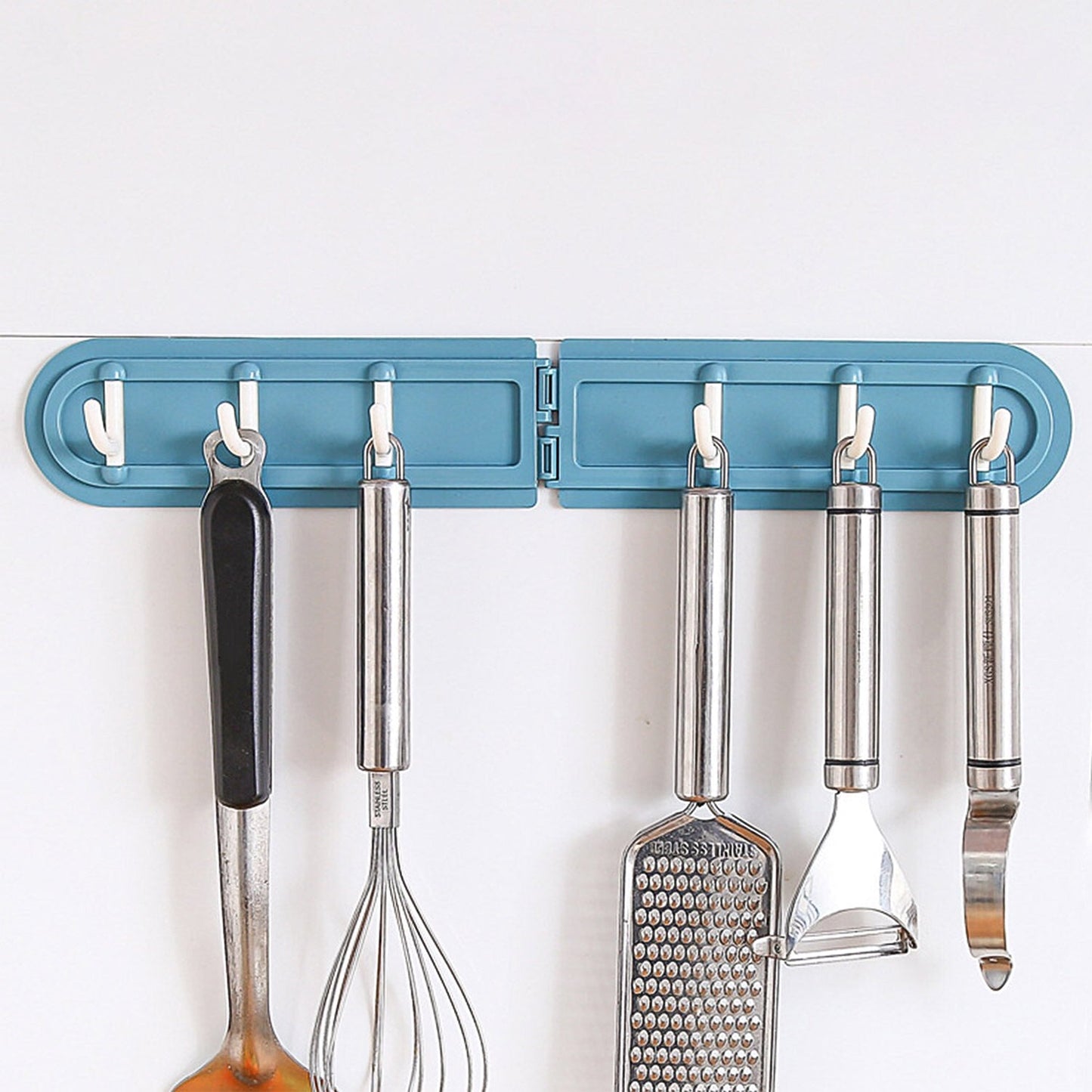 Rotating and foldable hook rack in use for space-saving home organization