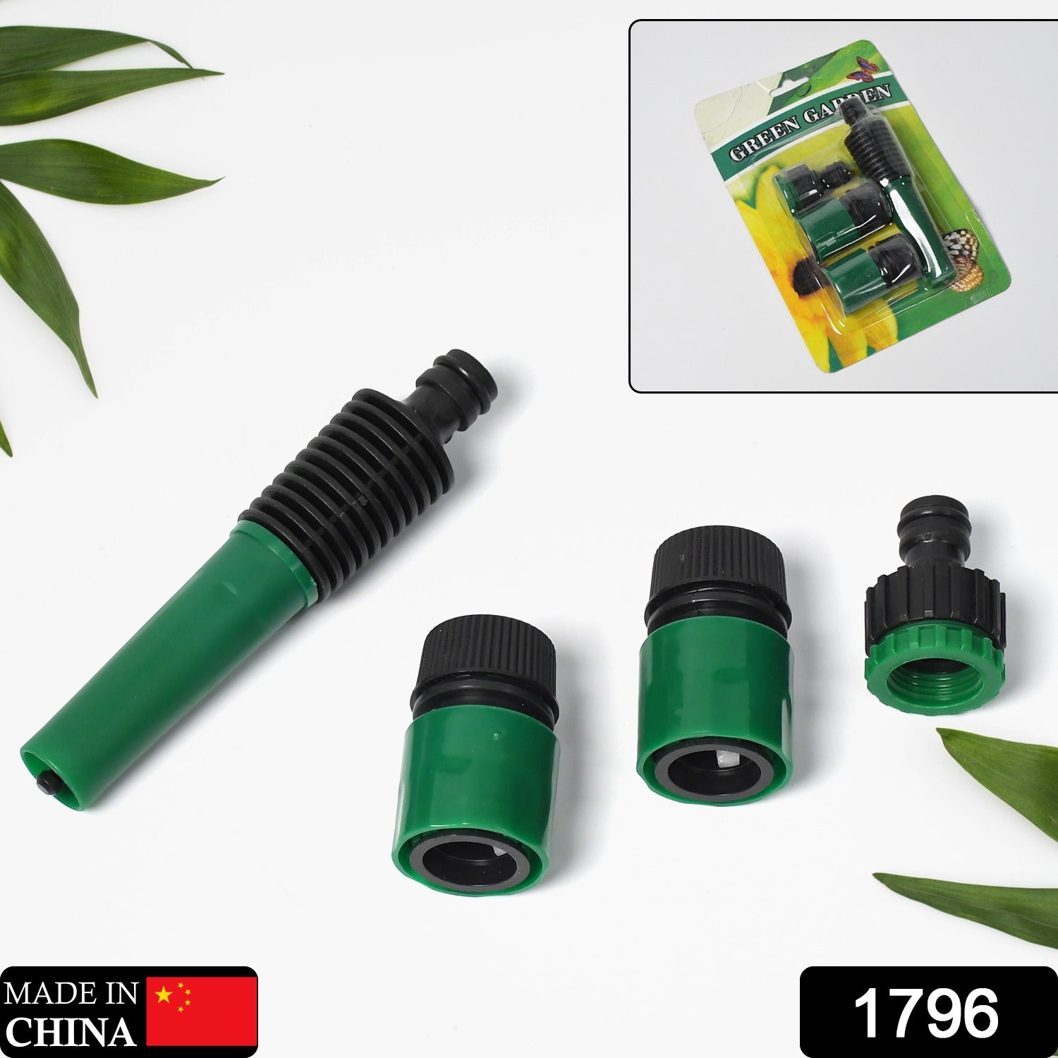A 4-piece garden hose nozzle connected to a hose for efficient outdoor watering.