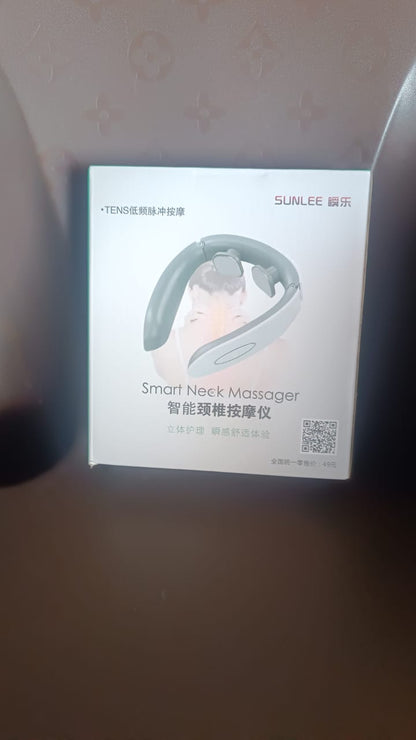 A lifestyle image showing the Electric Neck Massager in use for relaxation.