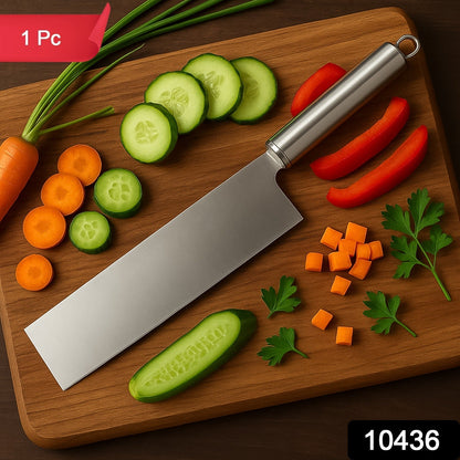 Vegetable cleaver knife chopping fresh vegetables in kitchen