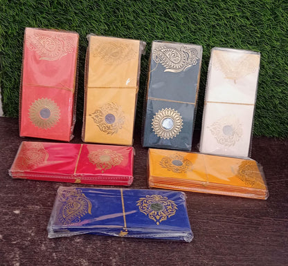 Group of glossy premium designer wedding envelopes displayed together.