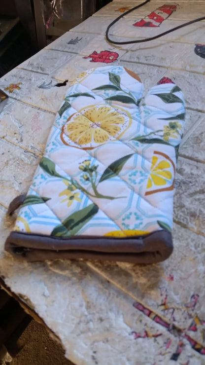Lifestyle shot of the cotton baking glove in a modern kitchen setting.