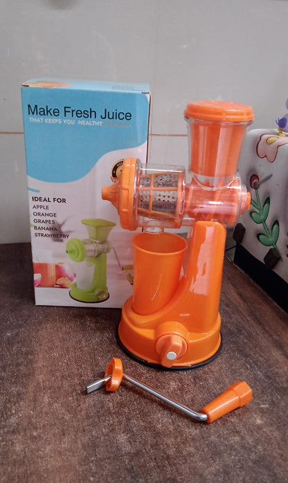 Packaging of the Quickslice Manual Fruit Juicer with all included accessories.
