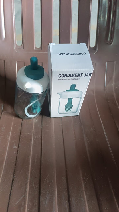 Secure lid and silicone brush mechanism of the glass oil dispenser.