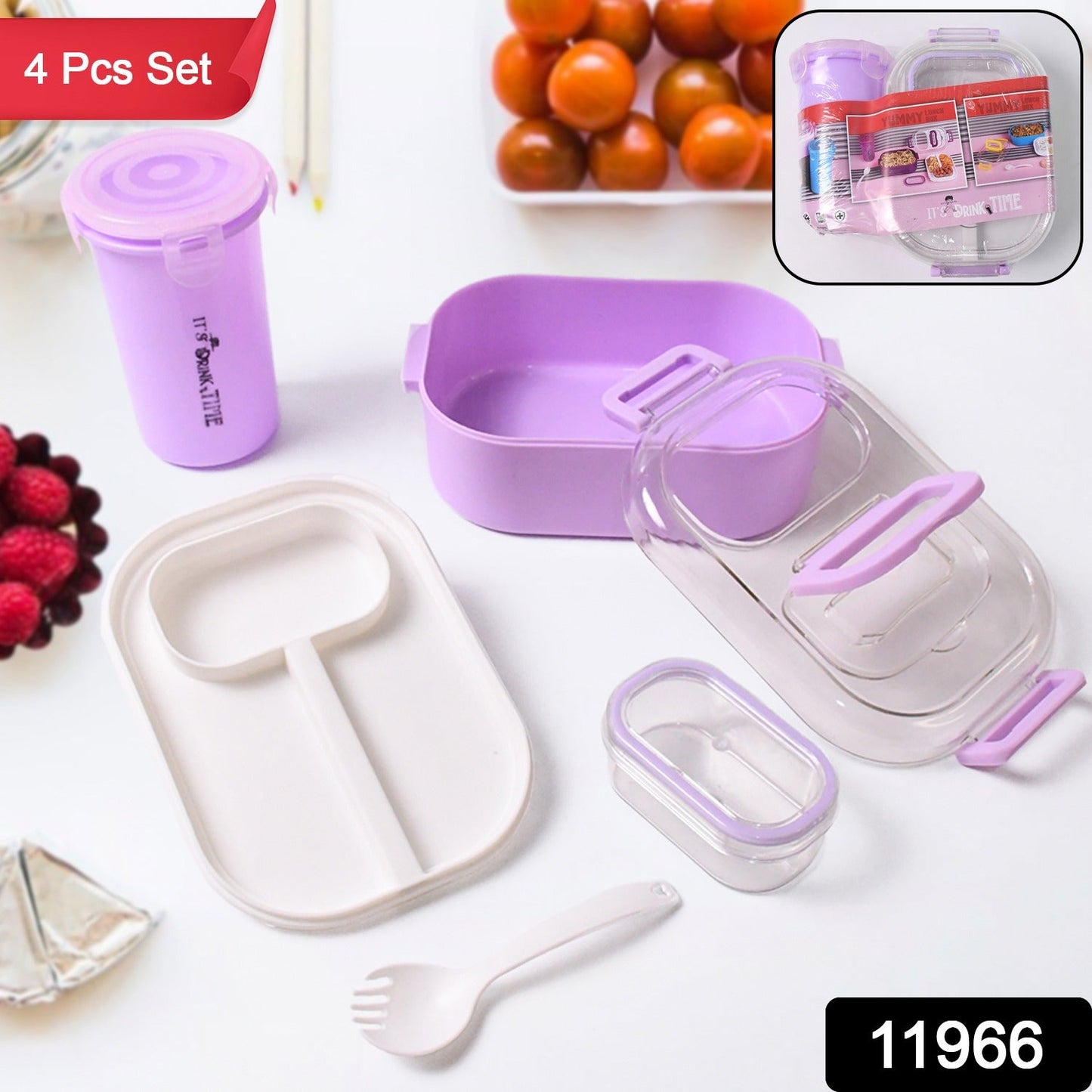 Lunch box set displaying multiple food compartments and included utensils