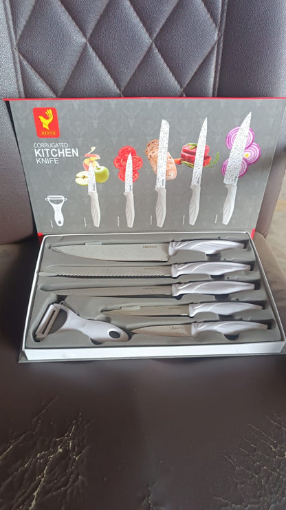 Complete 6-piece kitchen knife set with marble finish blades and peeler