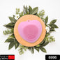 Heart-shaped silicone face wash brush for deep skin cleansing.