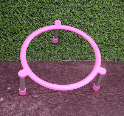 Stainless steel matka stand with a fruit basket placed on top.