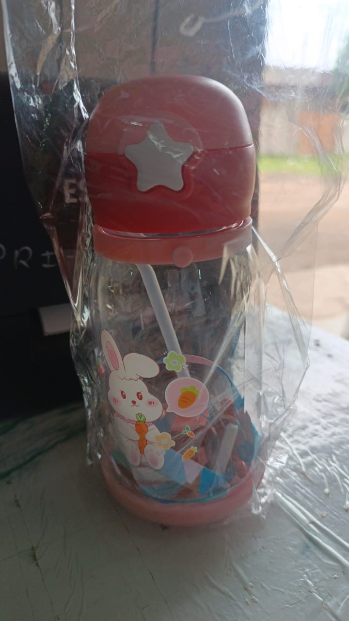 Alternative angle of kids cartoon water bottle with antler cap and strap