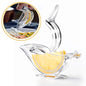 Transparent bird-shaped manual citrus juicer for lemons and oranges.