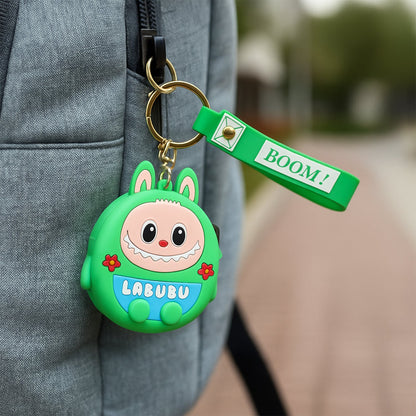 Cartoon coin pouch clipped onto a metal keyring for easy attachment