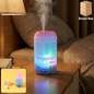 Portable Mini Humidifier emitting a cool mist for improved air quality.