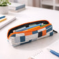 Front view of designer fabric zipper pencil pouch with stylish print
